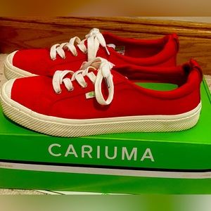 Cariuma low red canvas sneaker. Women’s size 9.